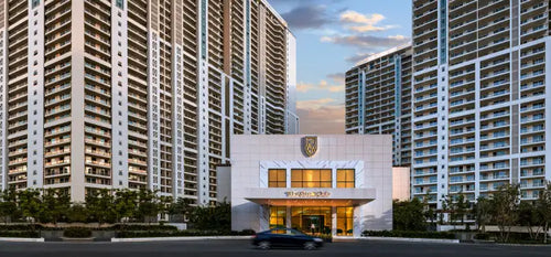 DLF THE CREST luxury residential towers with modern architecture and grand entrance in Gurgaon, ideal for premium real estate investment.